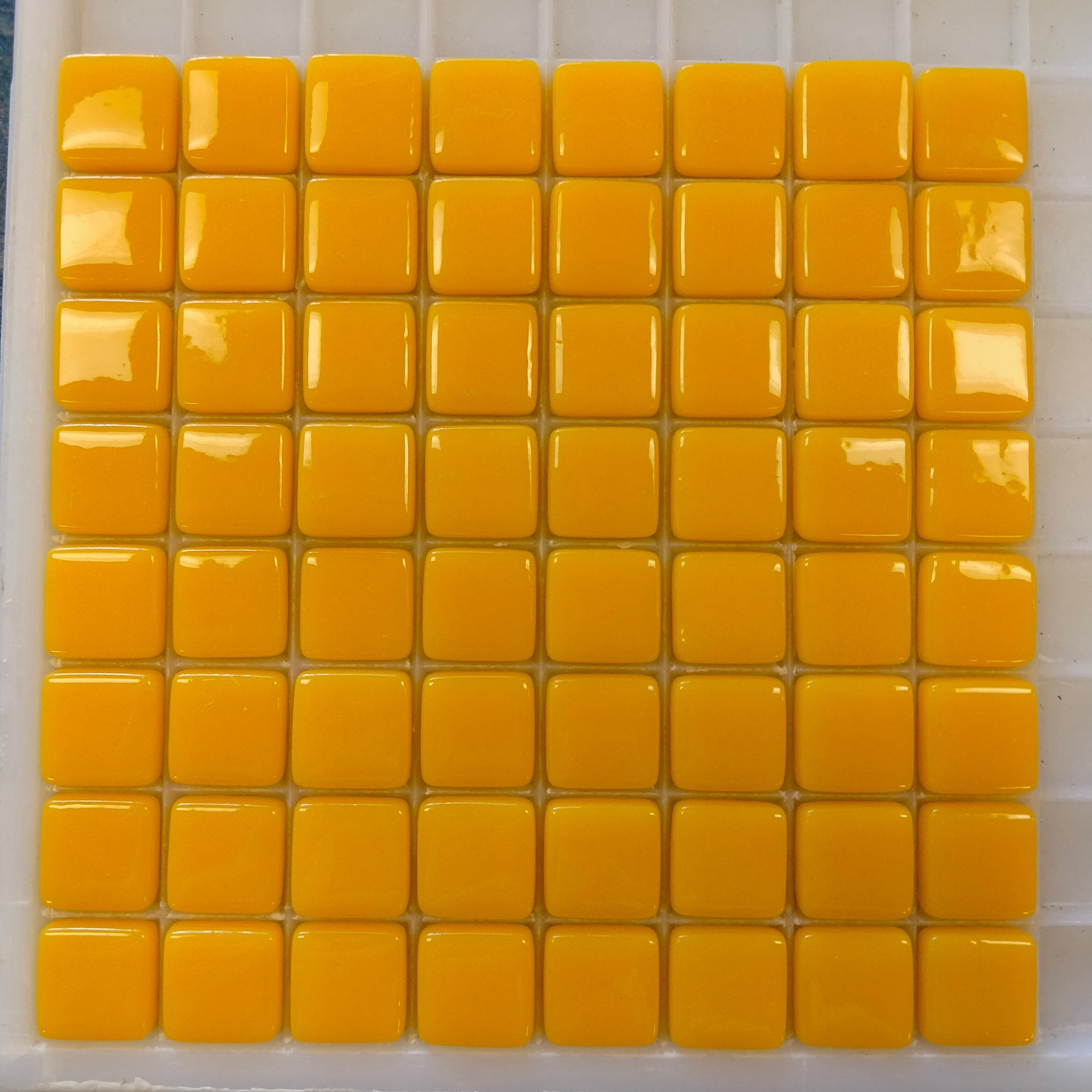 132-g Marigold–sheeted tile